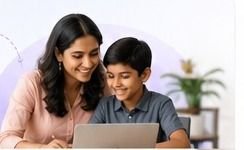 A parent and child looking at a laptop together